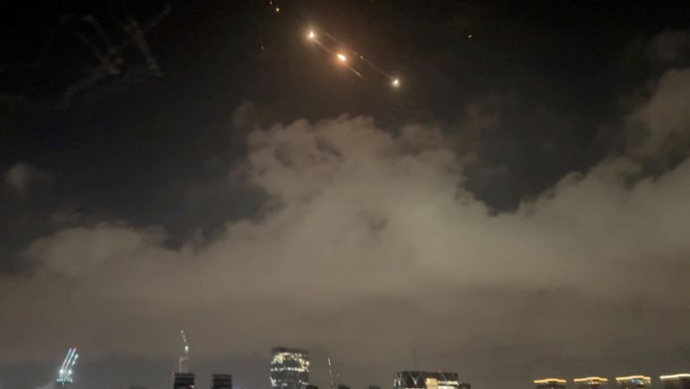 Rockets light up the sky in Tel Aviv, Israel, June 15, 2025, in this screengrab obtained from a social media video. Ran Goldman/via REUTERS THIS IMAGE HAS BEEN SUPPLIED BY A THIRD PARTY. MANDATORY CREDIT. NO RESALES. NO ARCHIVES.