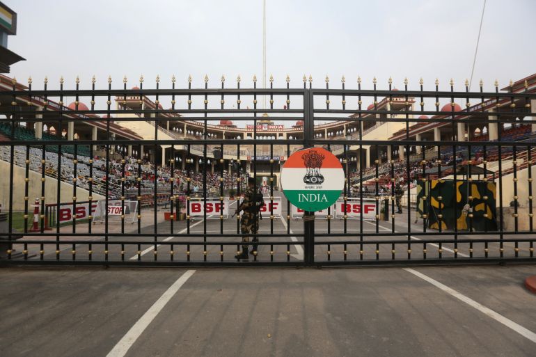 epa12073870 A Indian soldier stands on the Indian side of the Pak-India border during the flag lowering ceremony, at Pakistan-India border in Wagah, Pakistan, 04 May 2025. Pakistan's Defense Minister Khawaja Asif has issued a stern warning to India against any attempts to block or divert water under the Indus Waters Treaty, labeling such actions as 'acts of aggression' that would provoke a strong military response from Pakistan after India decided to suspend the treaty in retaliation for alleged Pakistani support of 'cross-border terrorism.' EPA-EFE/RAHAT DAR