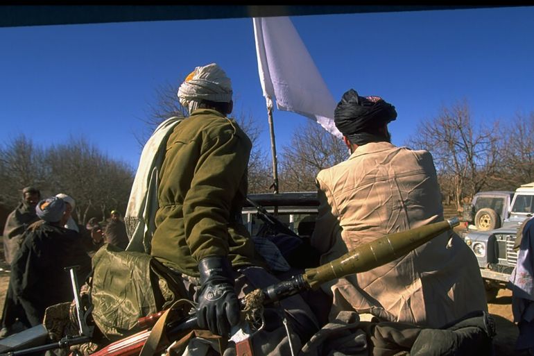 Taliban fighters at HQ taken fr. opposition Hekmatyar mujahedin by radical Islamic cleric-led faction on top in civil war, nr. govt-held Kabul. (Photo by Robert Nickelsberg/Getty Images)