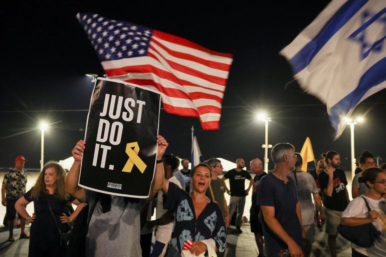 Demonstrators take part in a protest to demand the immediate release of hostages held in Gaza since the October 7, 2023 attack on Israel by Hamas, near the U.S. Consulate in Tel Aviv, Israel, July 26, 2025. REUTERS/Ronen Zvulun