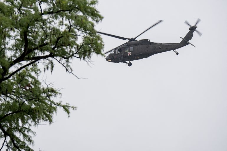 KERRVILLE, TEXAS - JULY 04: A UH-60 Black Hawk helicopter conducts rescue operations along the Guadalupe River on July 4, 2025 in Kerrville, Texas. Heavy rainfall caused flooding along the Guadalupe River in central Texas with multiple fatalities reported. Eric Vryn/Getty Images/AFP (Photo by Eric Vryn / GETTY IMAGES NORTH AMERICA / Getty Images via AFP)