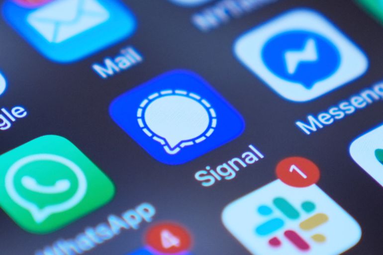 Signal app on a smartphone is seen on a mobile device screen Tuesday, March 25, 2025, in Chicago. (AP Photo/Kiichiro Sato)