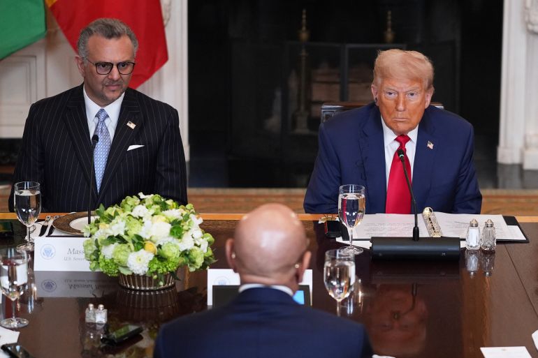 President Donald Trump and Dr. Massad Boulos, Senior Advisor for Africa, left, listen to Mauritanian President Mohamed Ould Ghazouani during a lunch with African leaders in the State Dining Room of the White House, Wednesday, July 9, 2025, in Washington. (AP Photo/Evan Vucci)