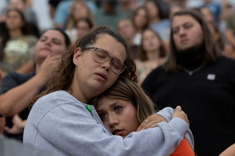 People attend a prayer service for flood victims in Kerrville, Texas, U.S., July 9, 2025. REUTERS/Umit Bektas TPX IMAGES OF THE DAY
