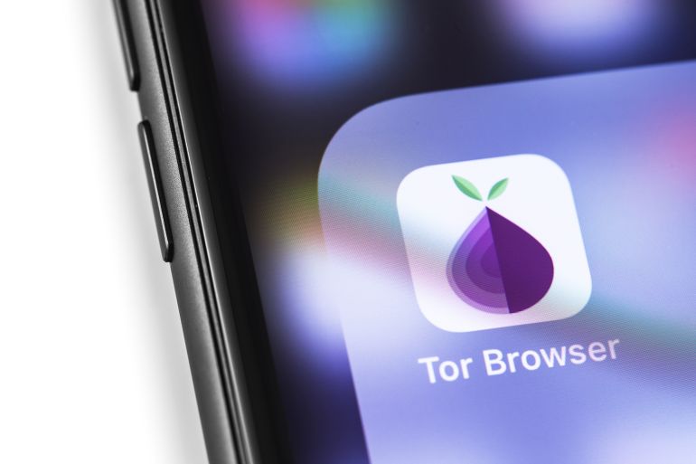 smartphone with TOR Browser icon app on the screen. The Tor project provides free software for anonymous communication on the internet. Moscow, Russia - March 17, 2019
