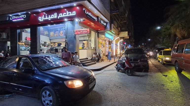 جانب من الشارع الرئيسي في منطقة جرمانا ريف دمشق_ الجزيرة نت