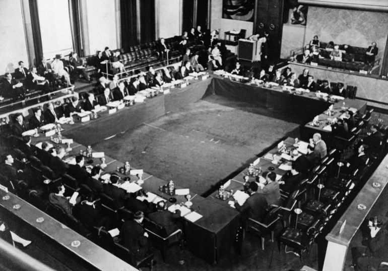 (Original Caption) Delegates sit around the conference table at the opening session of the Geneva Conference on January 18th. The United States and the Soviet Union, warning that nuclear war would devastate all mankind, jointly presented a draft treaty to stop any further spread of nuclear weapons.