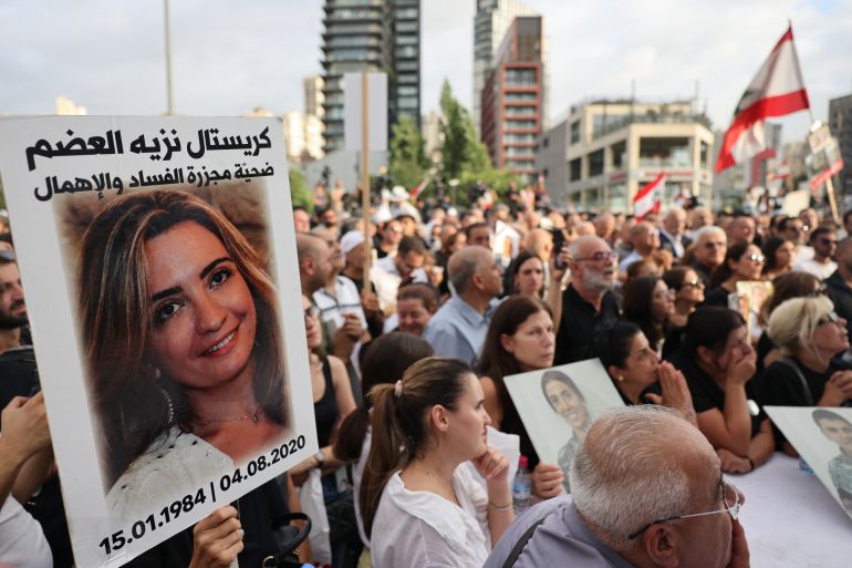 Lebanese demonstrators march during a gathering to honour the victims of the catastrophic port explosion in 2020 and to call for accountability for the blast, in Beirut on August 4, 2025.