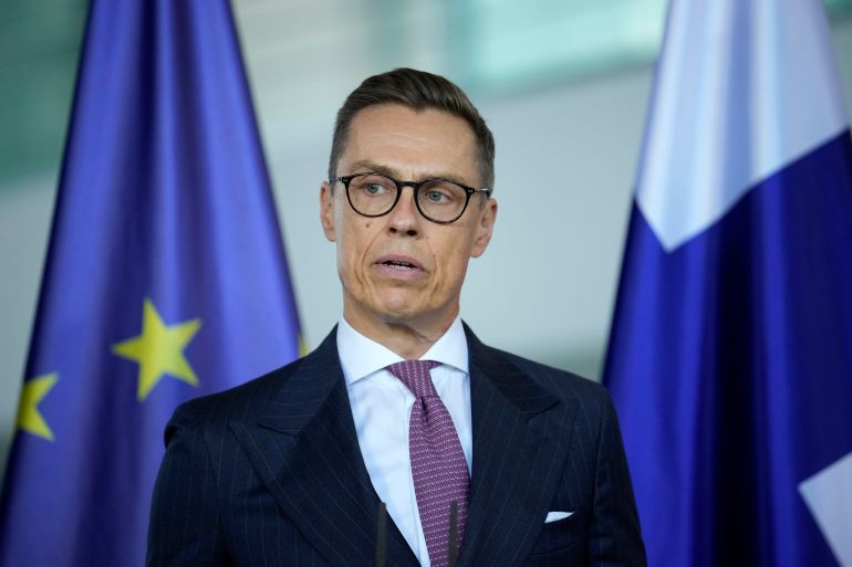 Finland's President Alexander Stubb talks to the media during a joint statement to the press with German Chancellor Olaf Scholz at the Chancellery in Berlin, Germany, Tuesday, Oct. 22, 2024. (AP Photo/Ebrahim Noroozi)