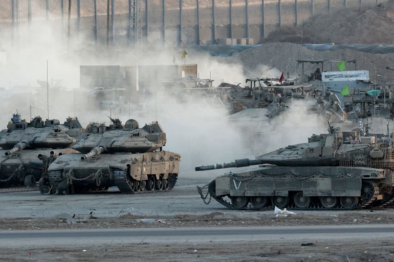Israeli army tanks are positioned in southern Israel on the border with the Gaza Strip, on September 3, 2025.